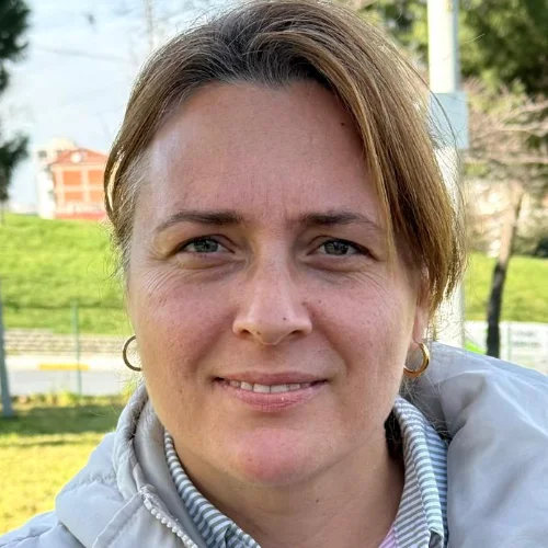 Özge E.-