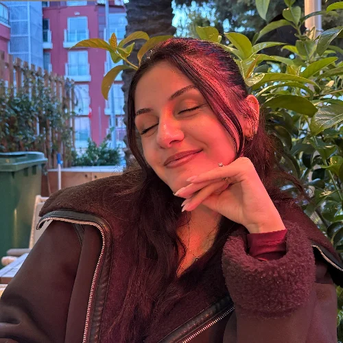 Tülay A.
