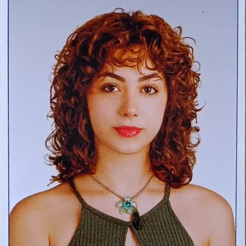 Mina E.-