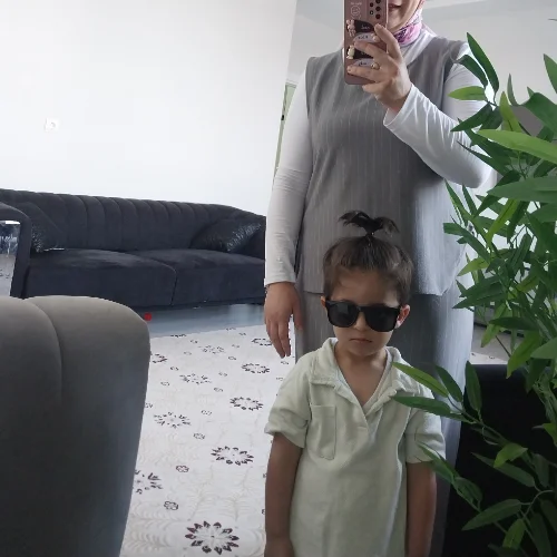 Elif K.-